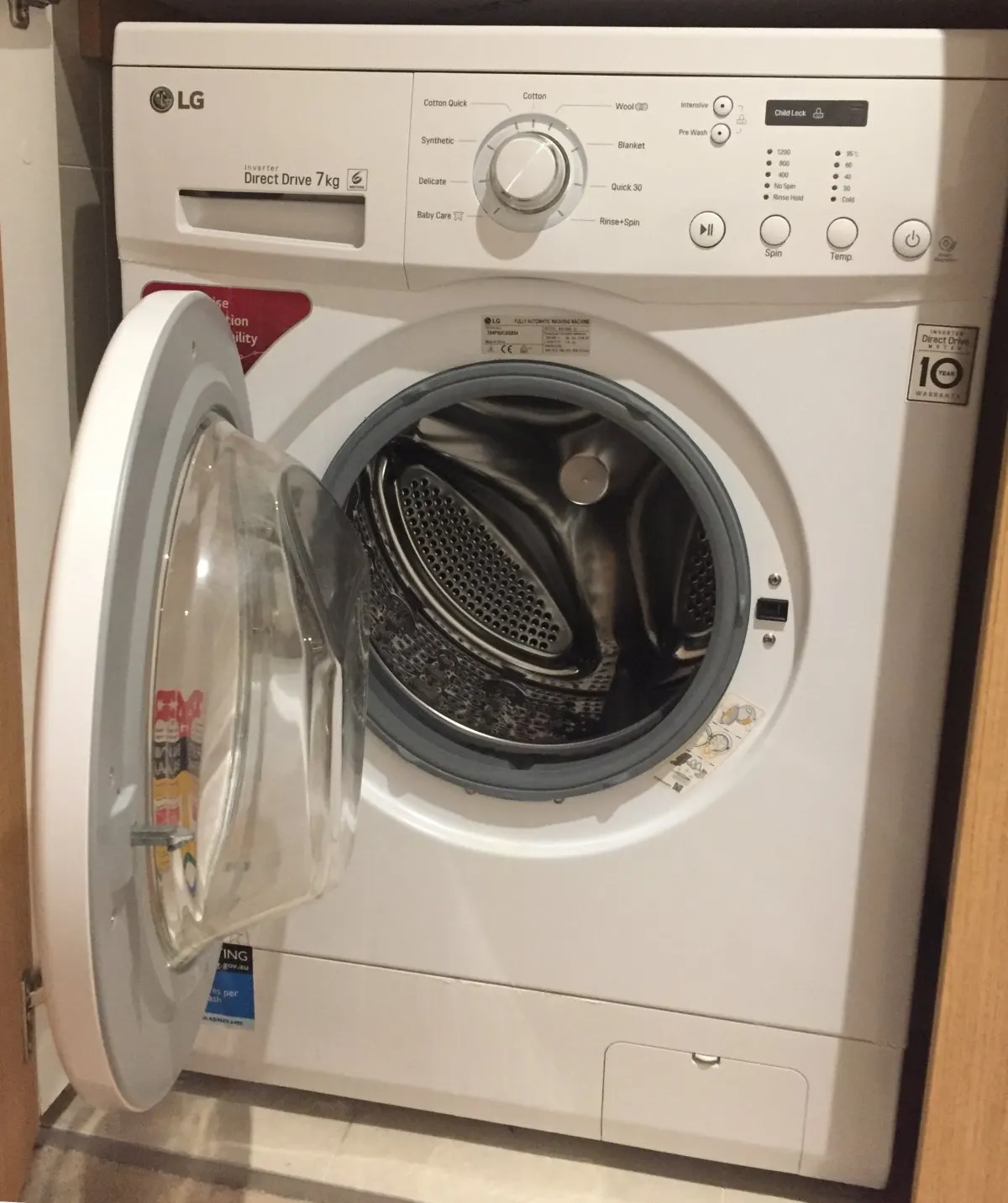 Voorladerwasmachine met ronde deur.